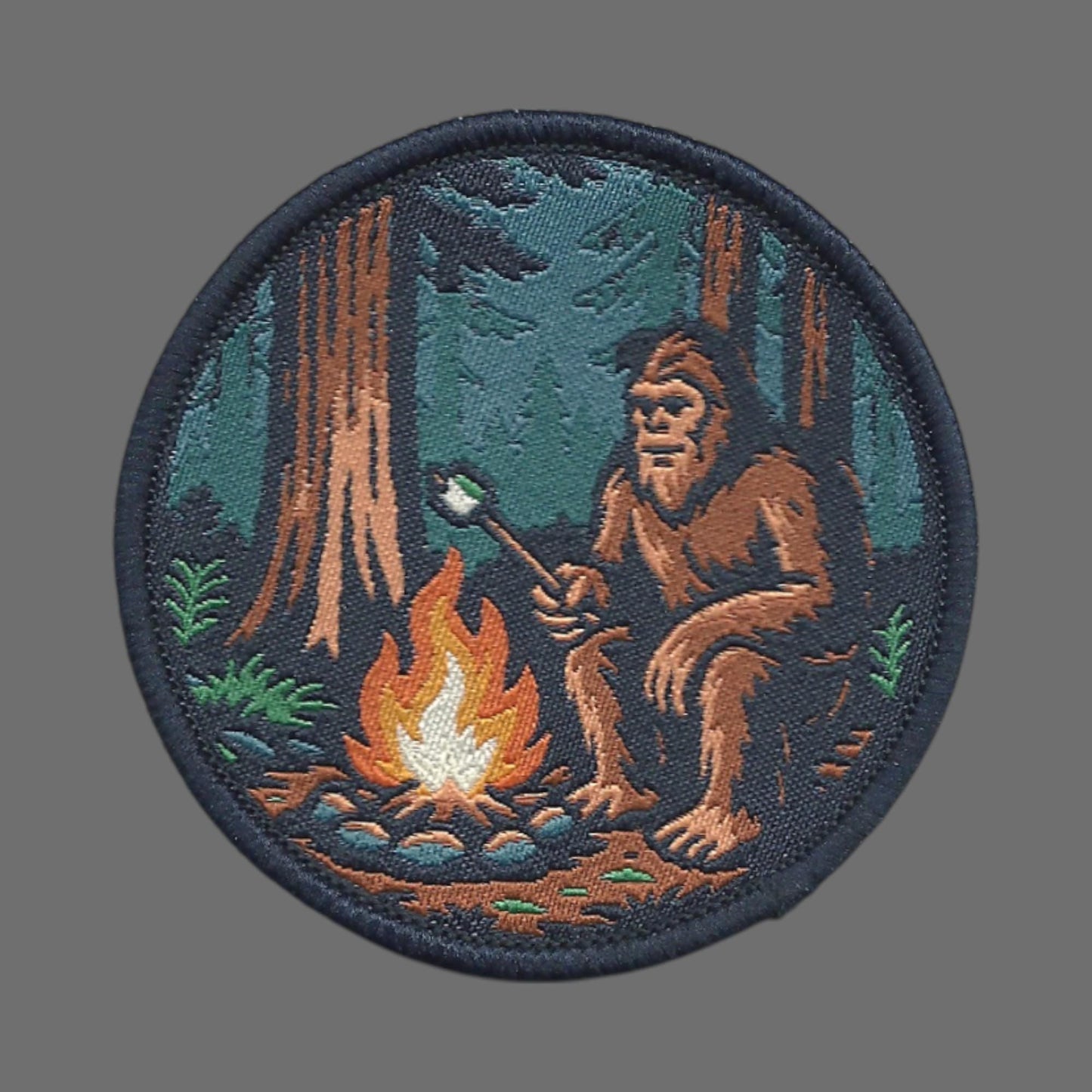 Bigfoot Campfire Roasting Marshmallow in the Woods Patch – Woven Iron On  - 10613